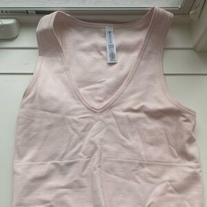 Athleta cropped tank in a light pink in size small